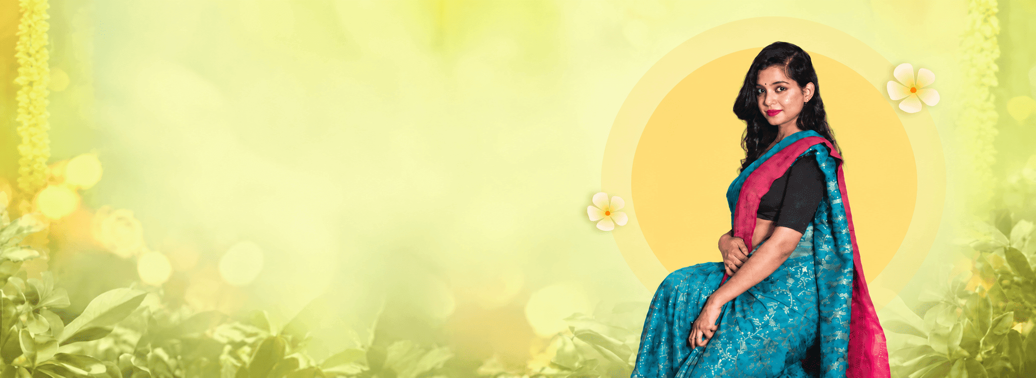 Model in a teal Banarasi saree with a magenta border, against a soft spring-green floral backdrop